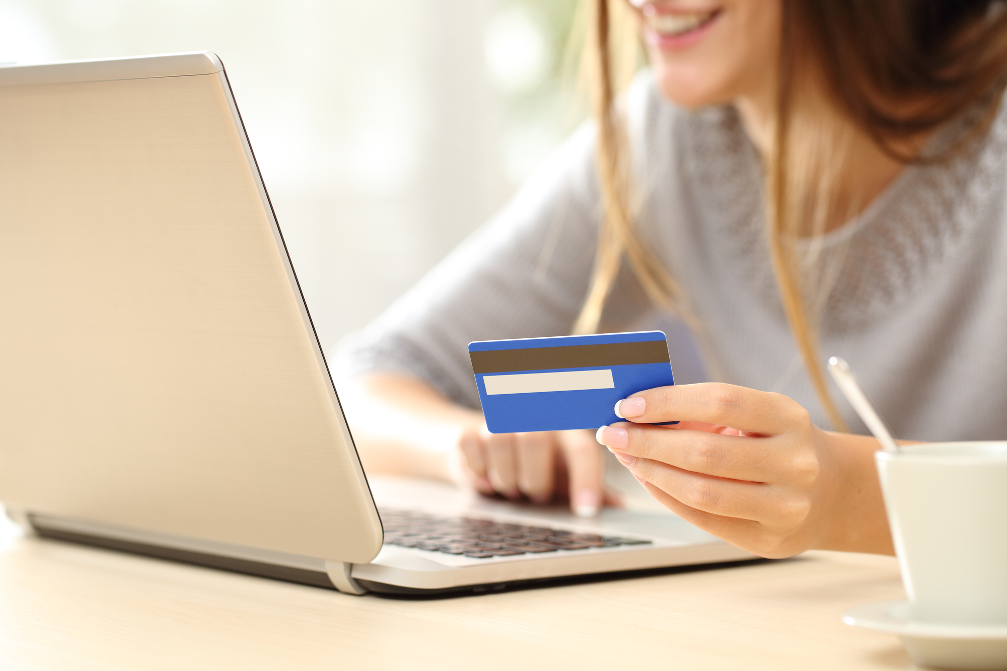 Woman buying online with credit card